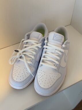 Nike Dunk Low Premium Next Nature “Football Grey Gum” sneakers. White and light